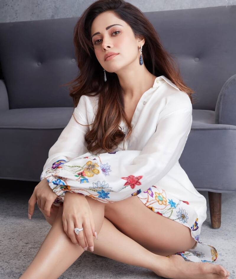 Nushrat Bharucha hot thigh and beautiul legs show  in white short dress new hot photoshoot 