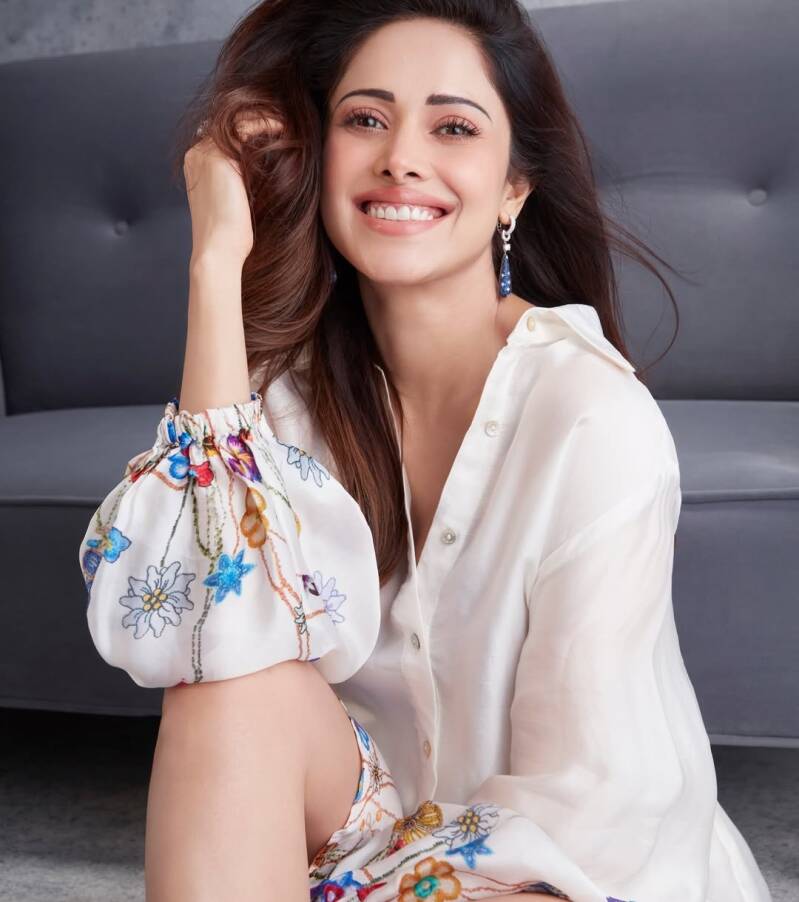 Nushrat Bharucha hot thigh and beautiul legs show  in white short dress new hot photoshoot 