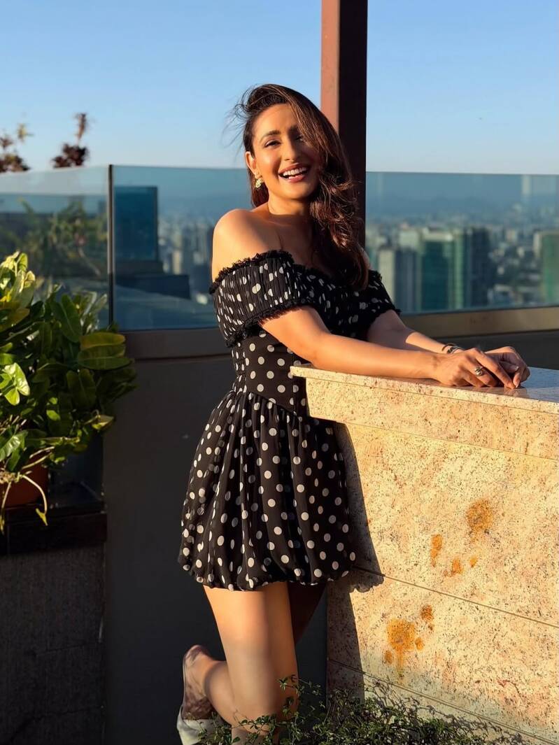 pragya-jaiswal-in-polka-dot-black-white-frock-hot-thigh-show-5-standard.jpg