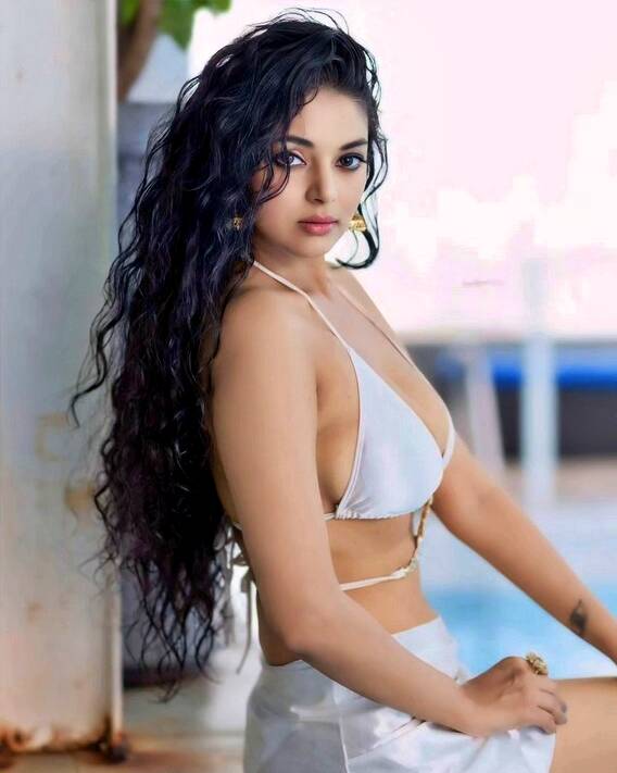 sanam-shetty-hot-in-white-bikin-in-the-pool-5-standard.jpg