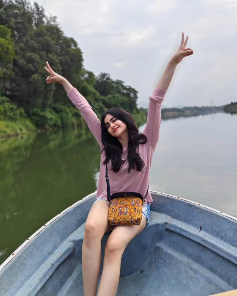 Adah Sharma enjoying a boat ride on a lake 1