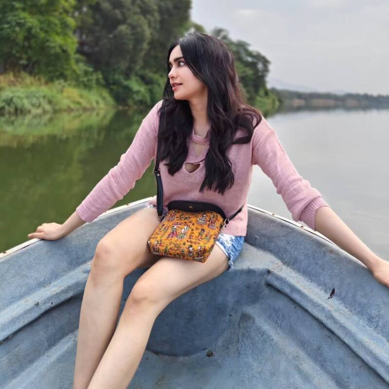 Adah Sharma enjoying a boat ride on a lake 3