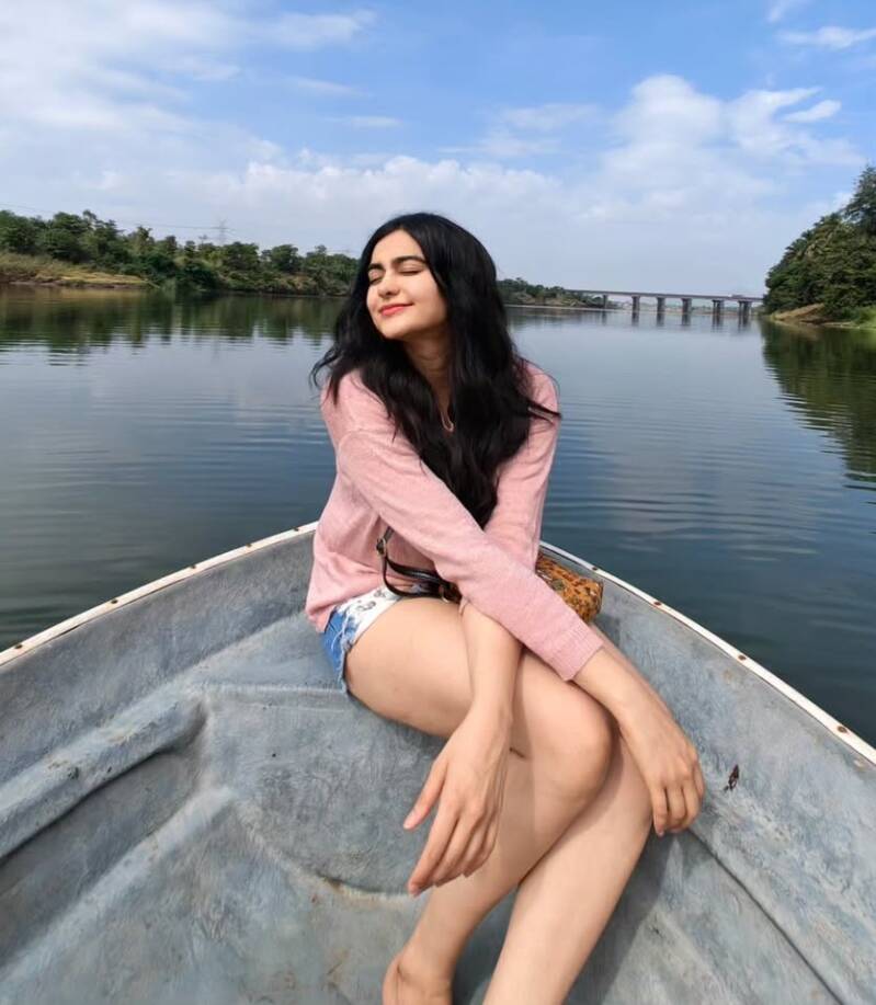 Adah Sharma enjoying a boat ride on a lake 