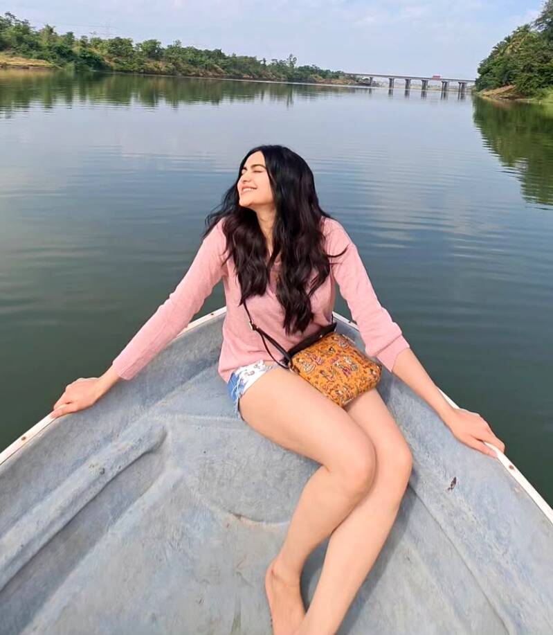 Adah Sharma enjoying a boat ride on a lake 4
