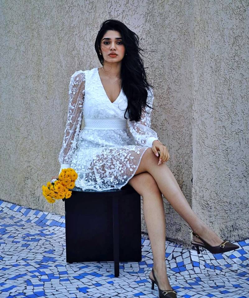 Krithy Shetty in white lace frock hot legs