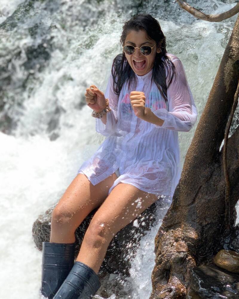 Sriti Jha's milky thigh and hot legs in the waterfall having fun
