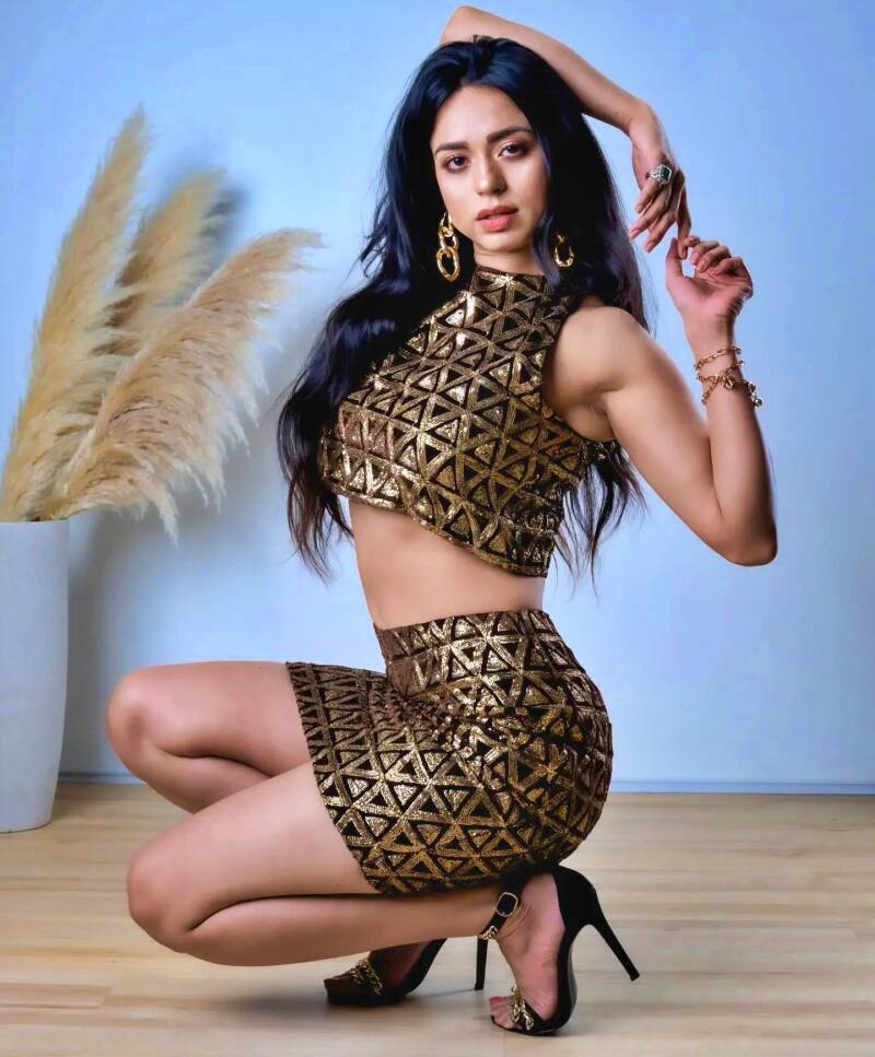 soundarya sharma  in golden mini skirt and crop top