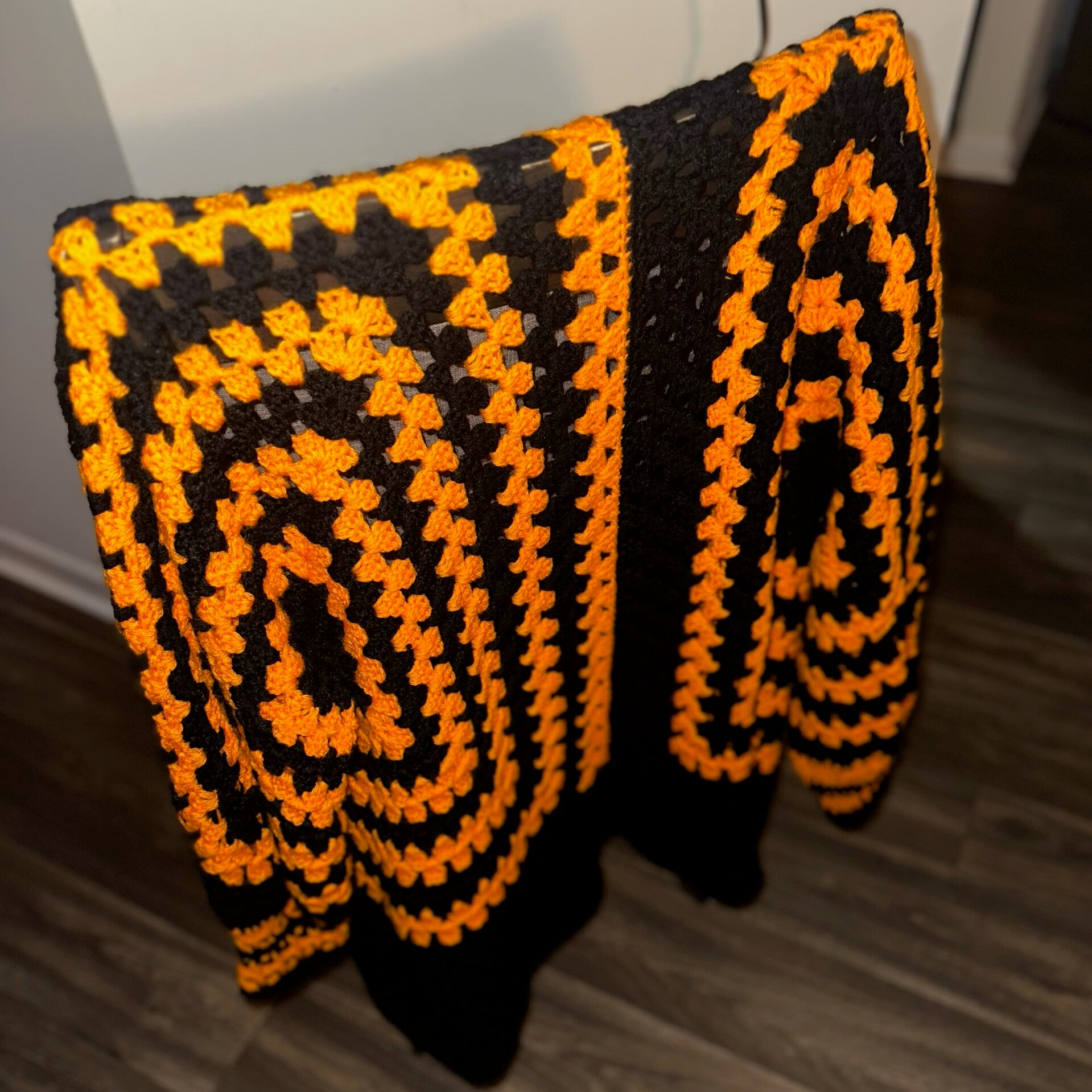 Orange and black sweater