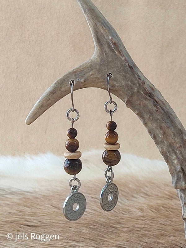 Tijgeroog met kokos en zilverkleurige zon