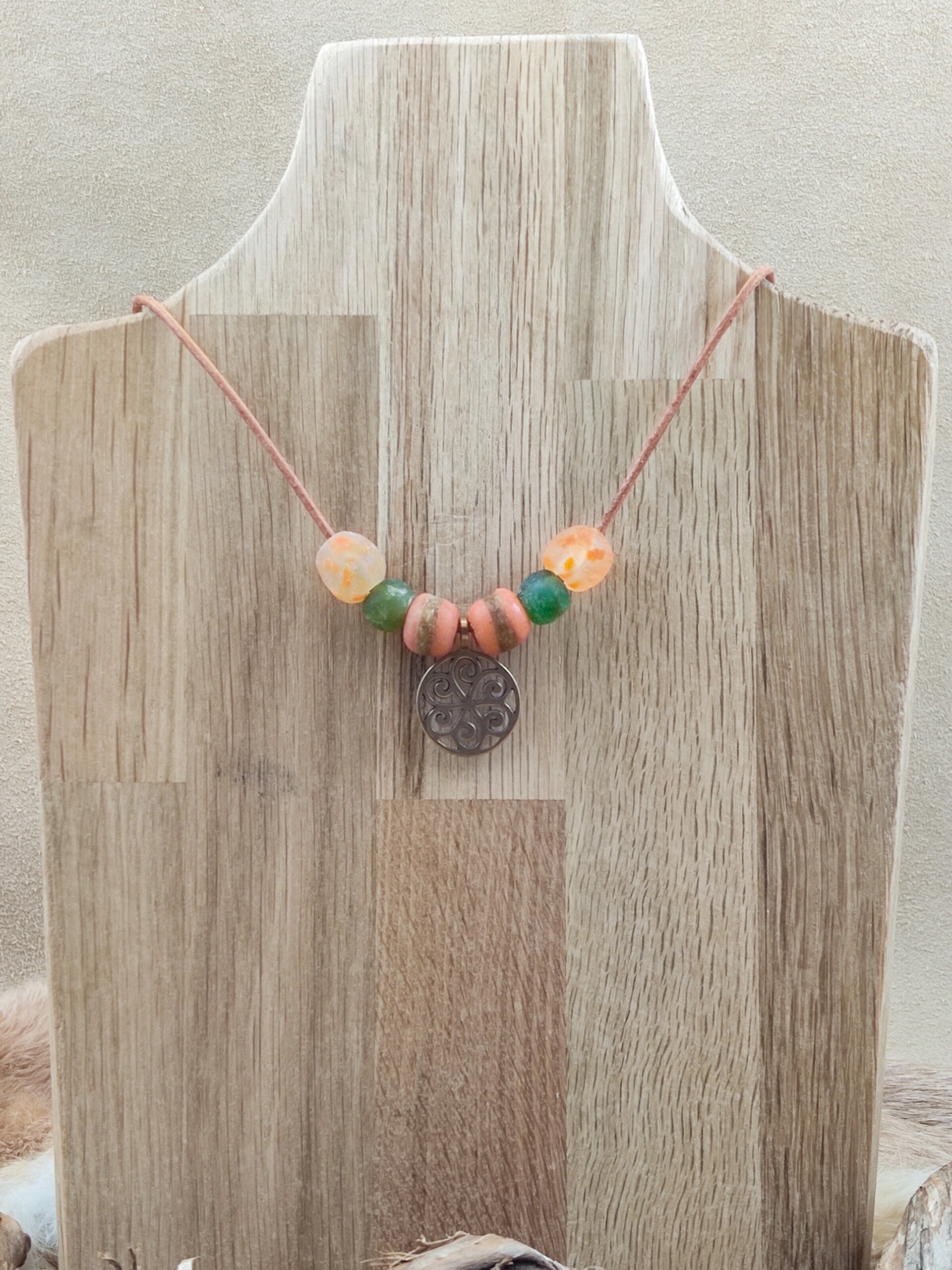 LB27 Bronzen zonsymbool