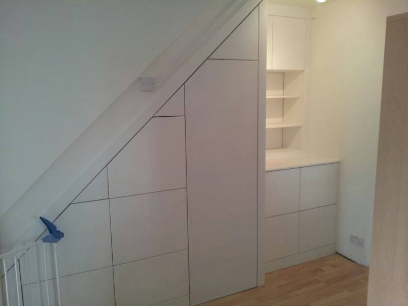 Contemporary understairs and alcove storage