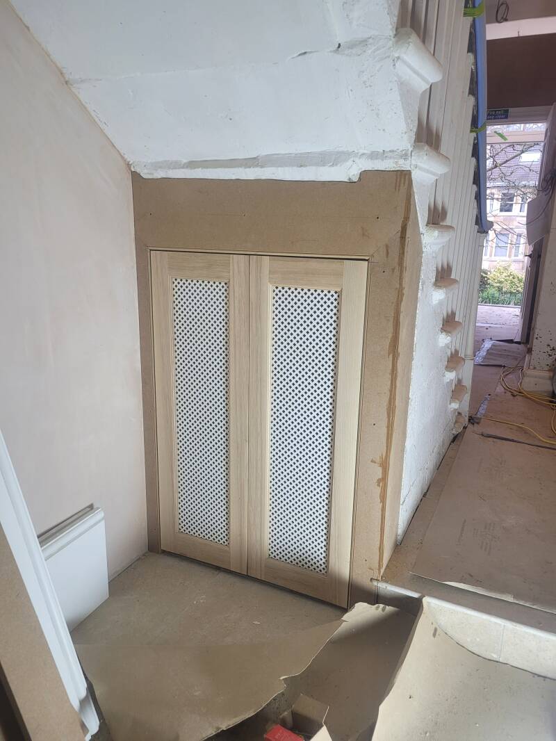 Bespoke small understairs cupboard