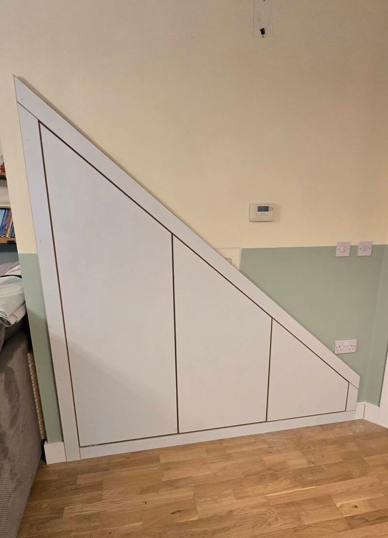 Bespoke understairs storage units 