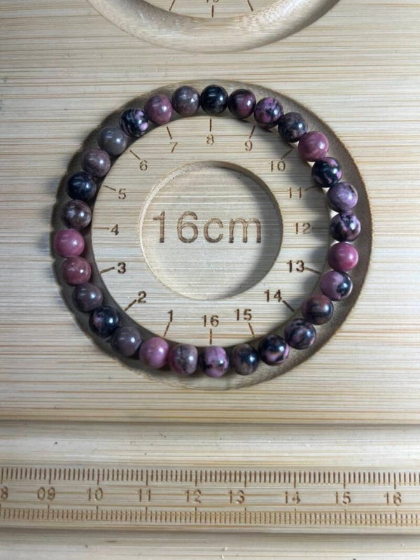 Rhodonite A + Madagascar ( taille 16 cm )