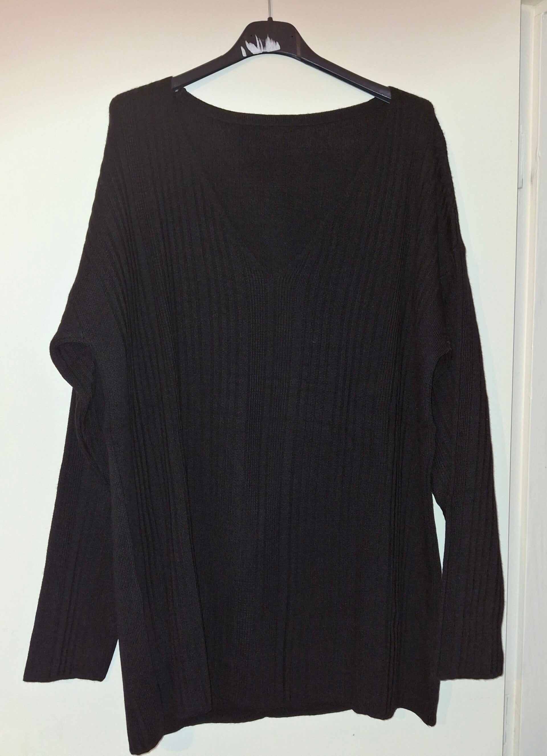 huispak met V hals en wolle stof.