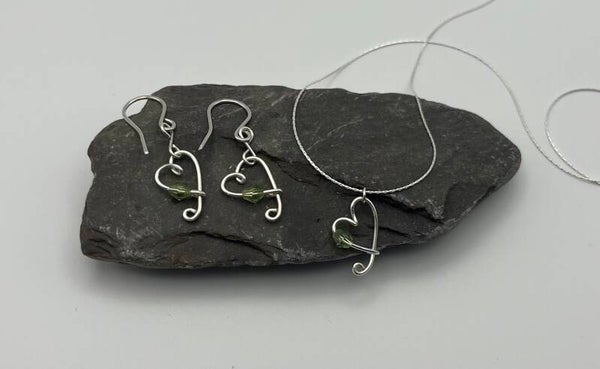 Silver heart earrings and necklace