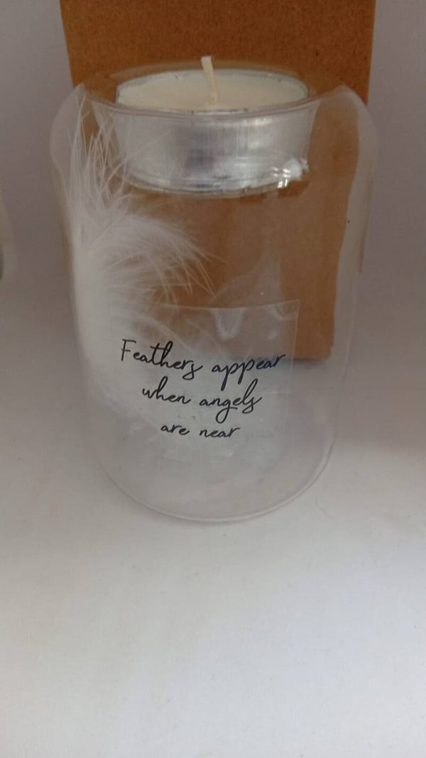 Feathers appear when Angels  are near t-light holders