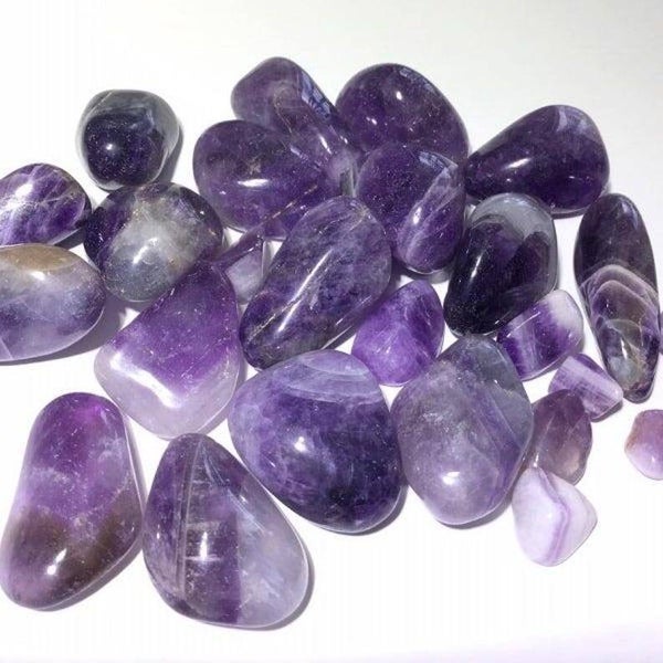Amethyst crystal thumbeld stone