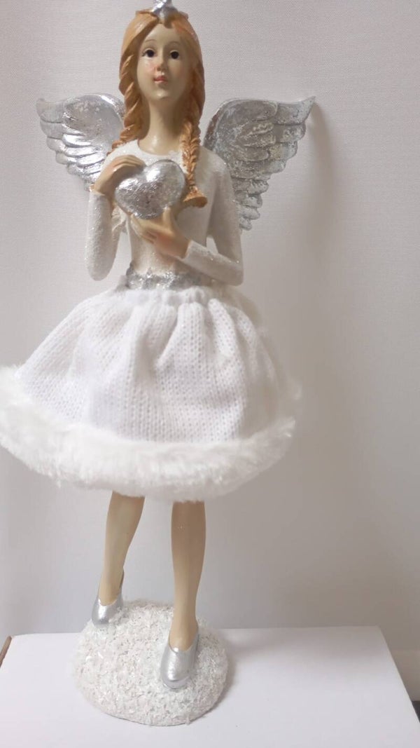 Large standing angel with silver wings