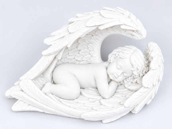 White resin baby angel in wings.