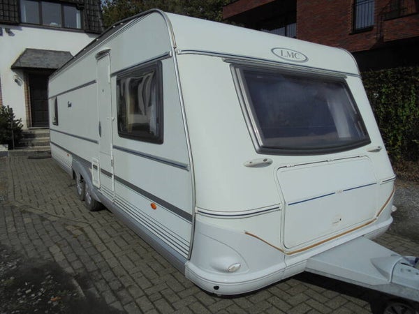 LMC Favorit CR25, 3/2007, 7 slaapplaatsen (vast bed+stapelbed+treinzit+rondzit), AIRCO, 1e eigenaar, voortent
