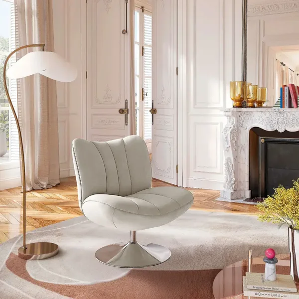 FAUTEUIL PIVOTANT MATELASSÉ ANDREW de chez HABITAT