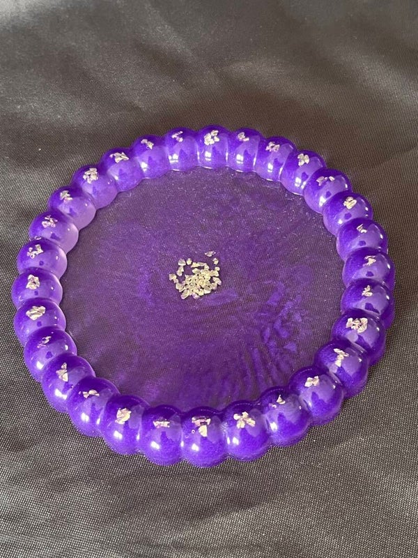 Vide poche violet rond