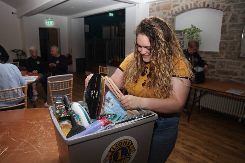Care leaver Catherine receives her Box for Living, reproduced with kind permission.