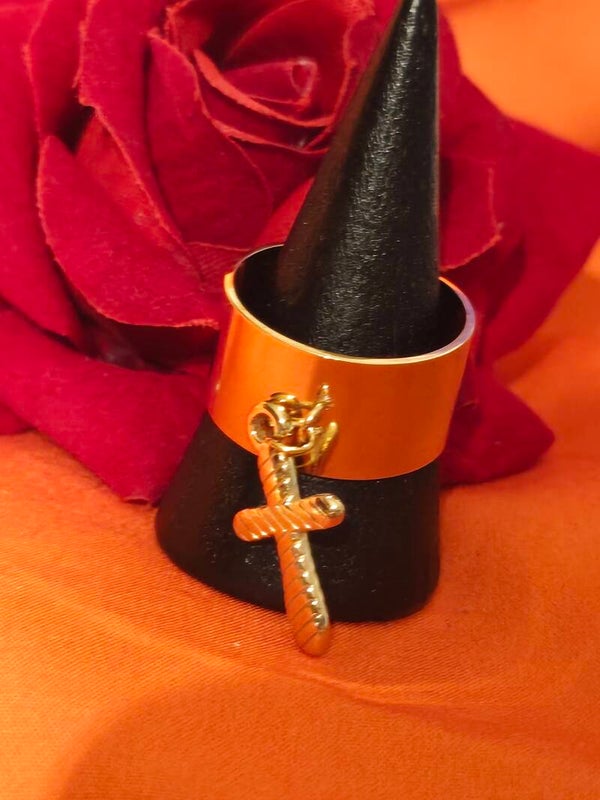 Bague croix pendante