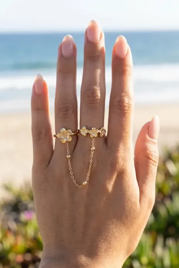 Bague fleur double chainette
