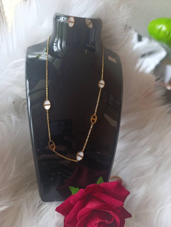 Sautoir et boucles d'oreilles