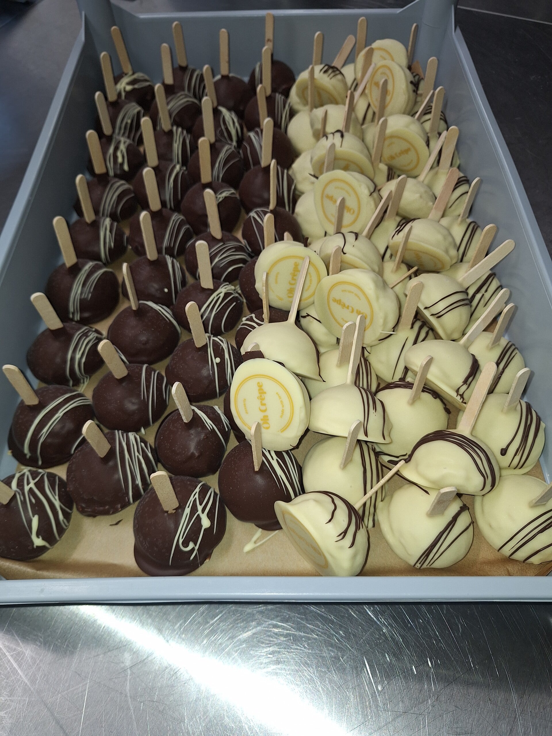 Ijslolly Mokka omhuld met chocolade, wit of fondant