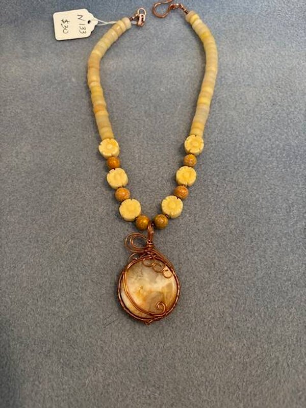 Necklace of wire wrapped Chalcedony and accenting beads