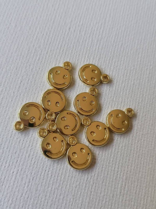 Gouden Smiley bedels per 2 stuks RVS