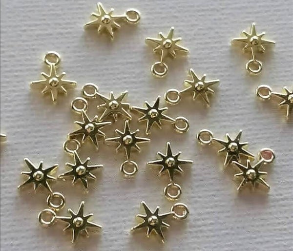 Gouden twinkels bedels per 2 stuks