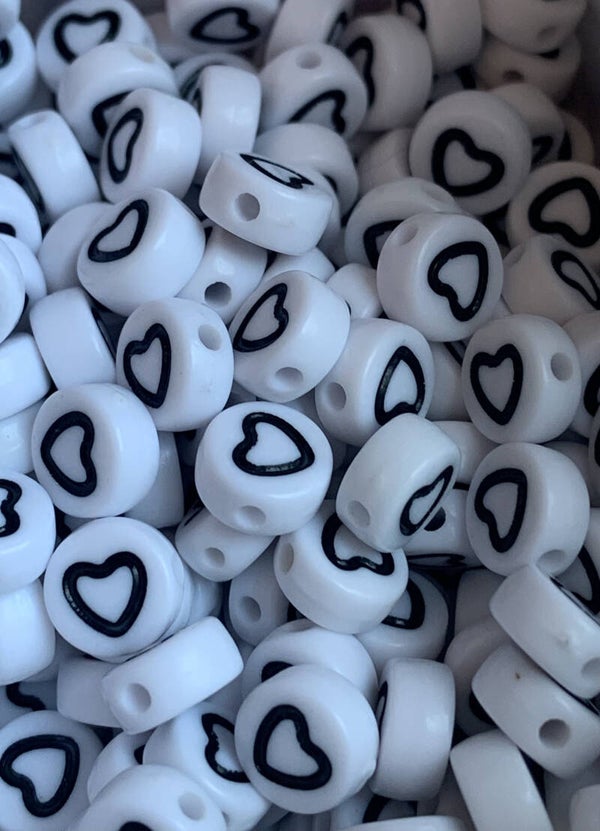 Open zwarte hartjes kralen per 5 stuks