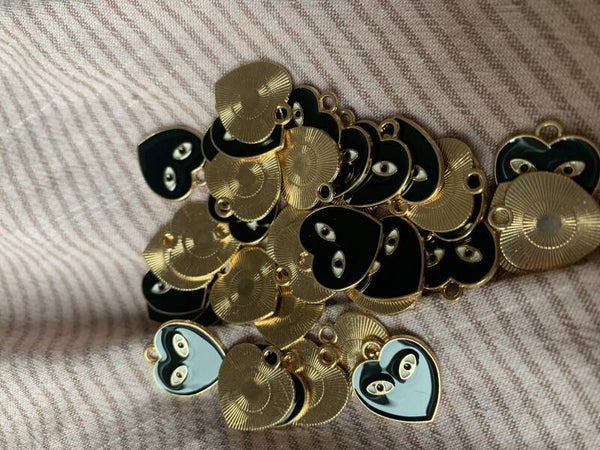 Vlinder licht roze 1 oog bedel per 2 stuks RVS