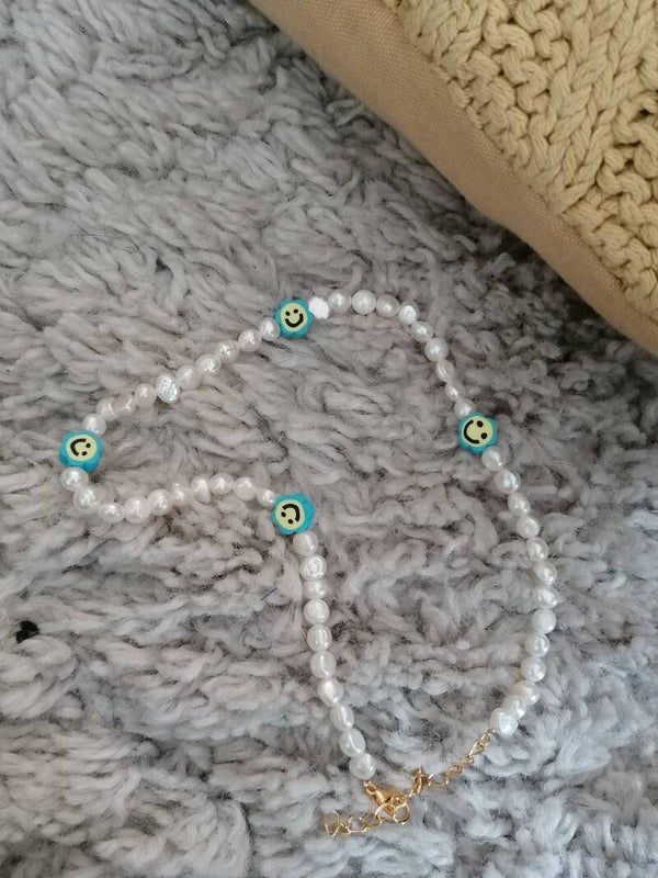 Zoetwaterparel - smiley kralen ketting RVS