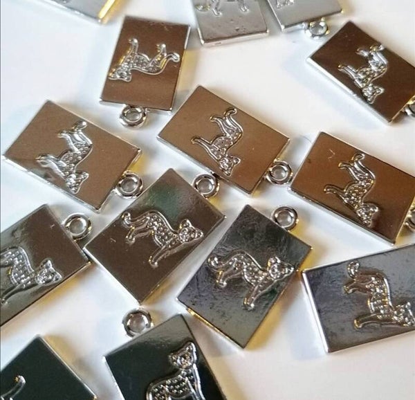 Zilveren lopende panter tags per 2 stuks RVS