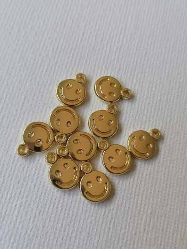 Gouden Smiley bedels per 2 stuks RVS