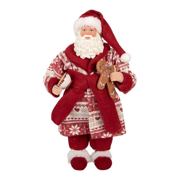 Père-Noël avec pain d'épices et tasse