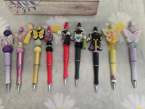 Beaded pen or keychain w tassel or charm