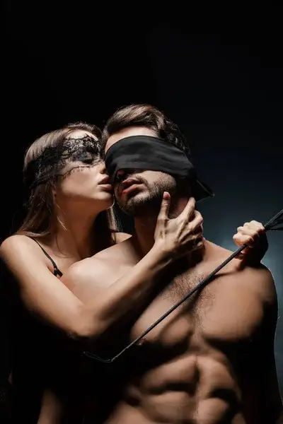 stock-photo-dominant-woman-holding-flogging-whip-submissive-blindfolded-man-black-standard.webp