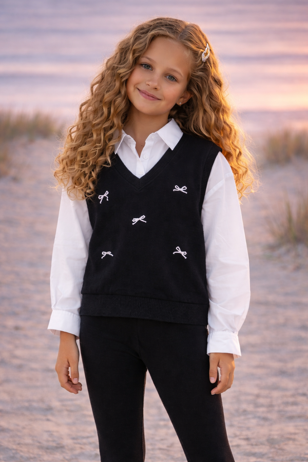 Meisjes trui met spencer look en strikjes zwart/wit
