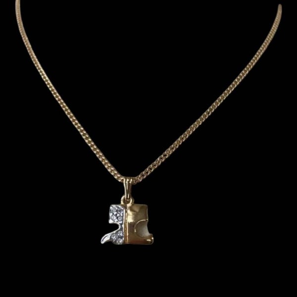 Courrèges · Pendentif Puzzle, 1990