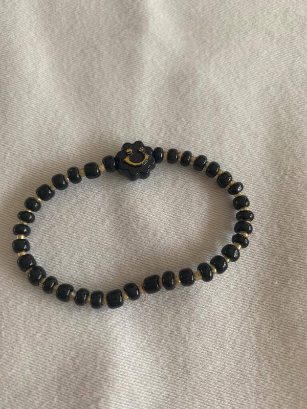 Armband zwart met goud