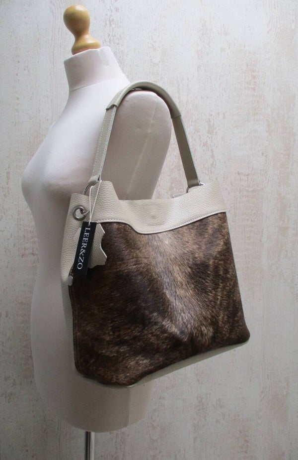Beige leren buideltas koeienhuid cognac/zwart