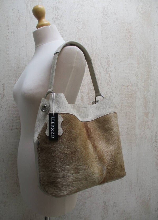 Beige leren buideltas koeienhuid taupe