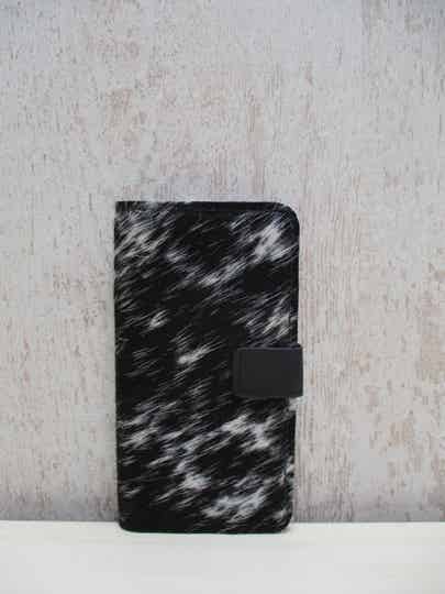 Bookcases iPhone 16 Pro zwart/wit