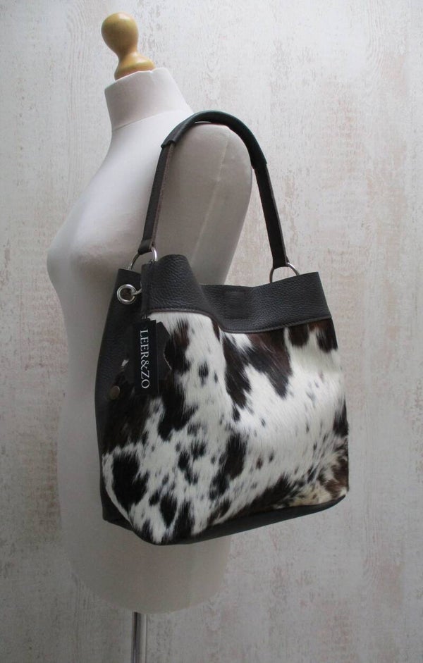 Bruin leren buideltas koeienhuid tricolor